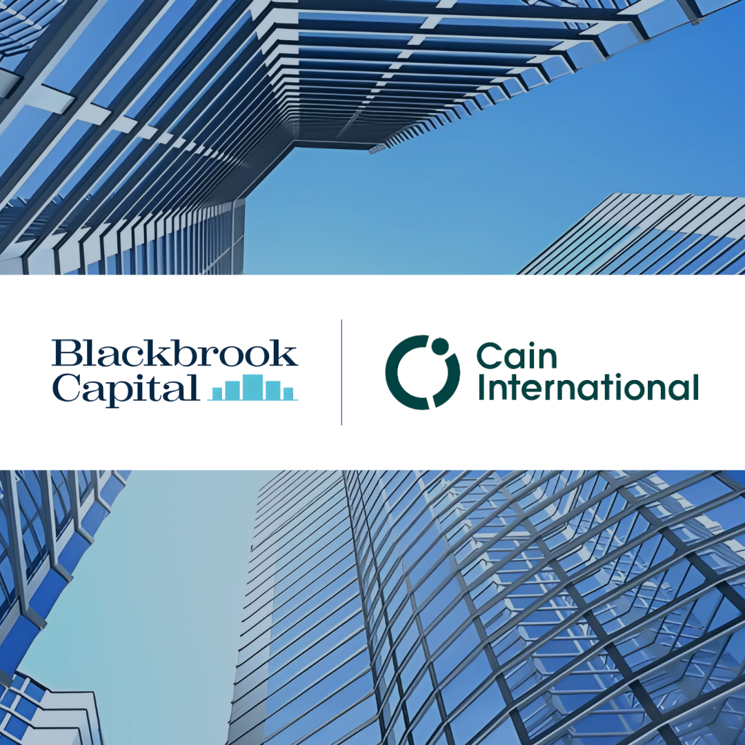 Two skyscrapers, with the logos of Blackbrook Capital and Cain International overlayed