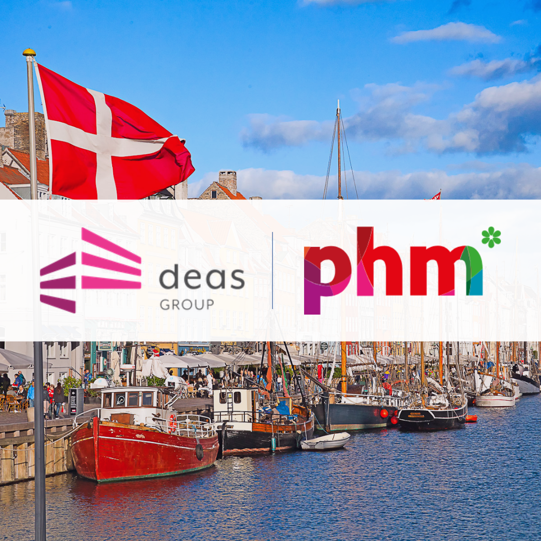 Danish property along a canal, overlaid with the DAES and PHM Group logos