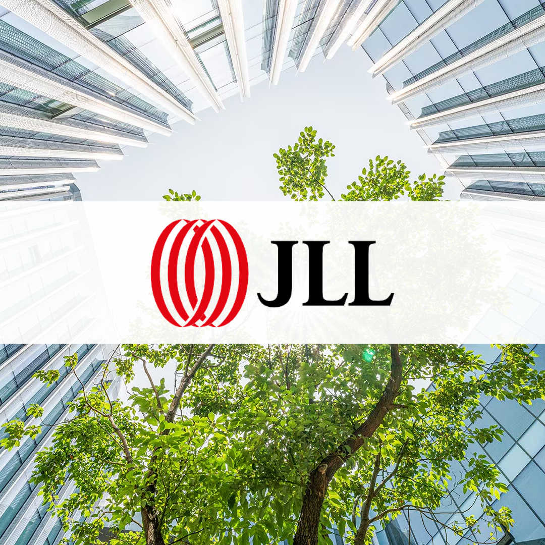 A tree in a modern building, with the JLL logo overlaid, representing the convergence of ESG and Tech in China
