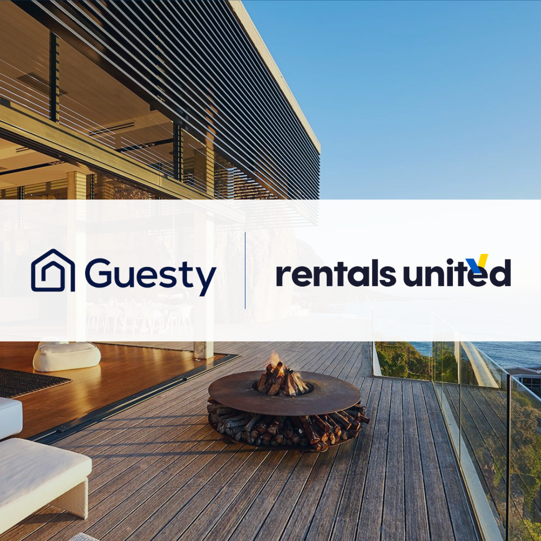 Beachfront holiday rental, with Guesty and Rentals United logos overlayed following their deal