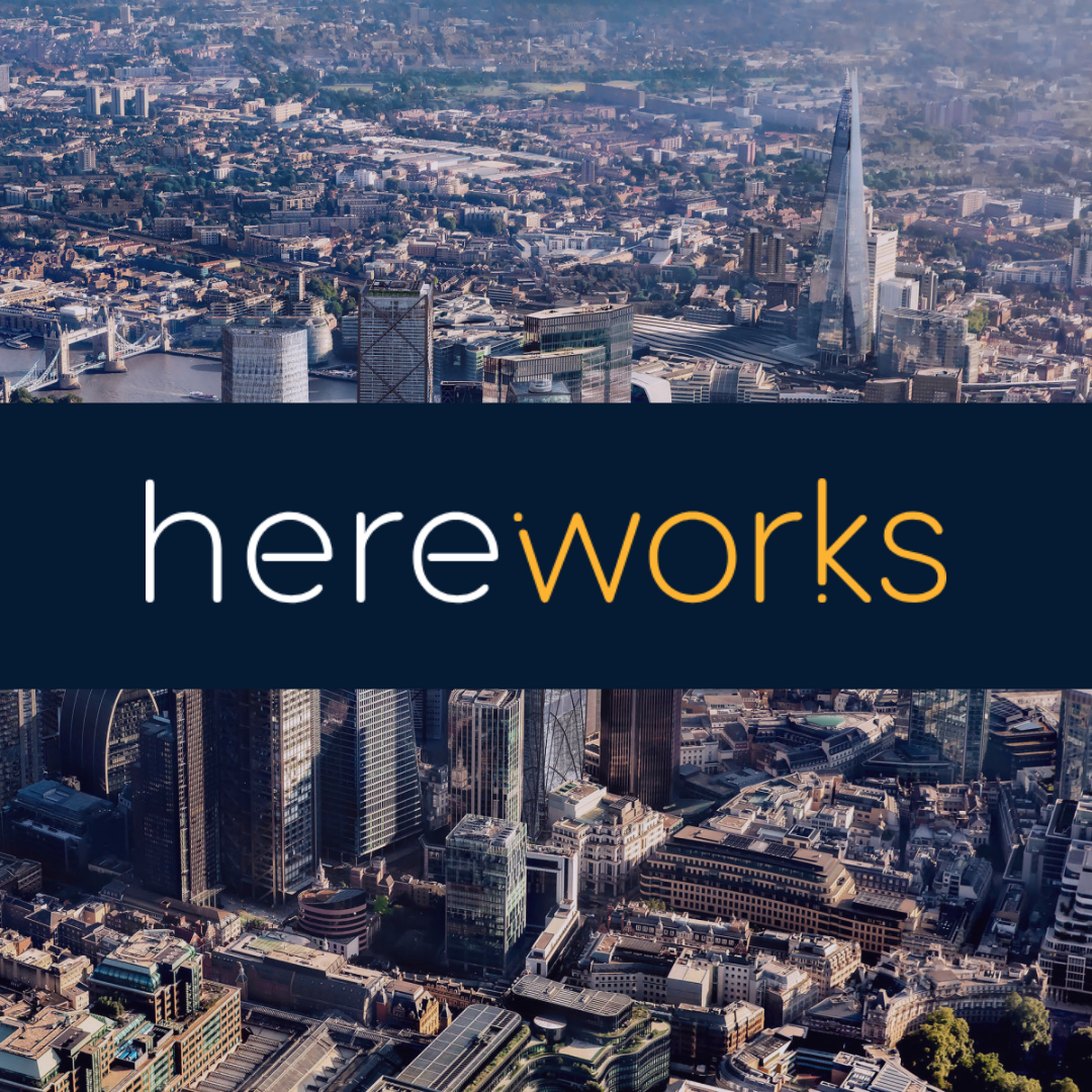 London skyline with smart buildings, overlayed with Hereworks logo