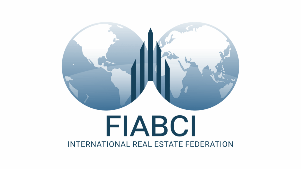 FIABCI logo showing two blue globe icons with a central architectural skyline, symbolizing international real estate networking