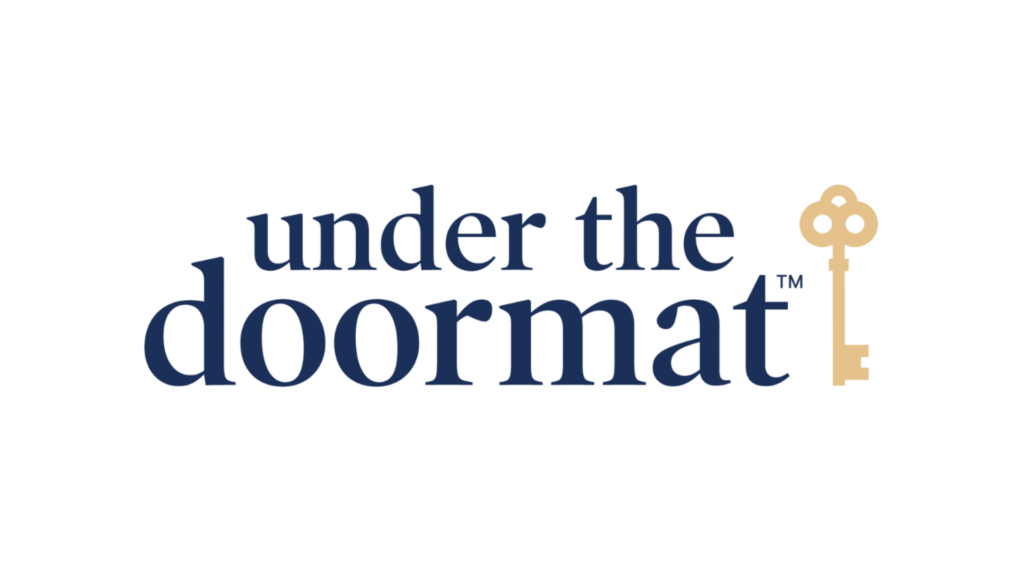 Logo for 'Under the Doormat': navy serif text with a gold key to the right