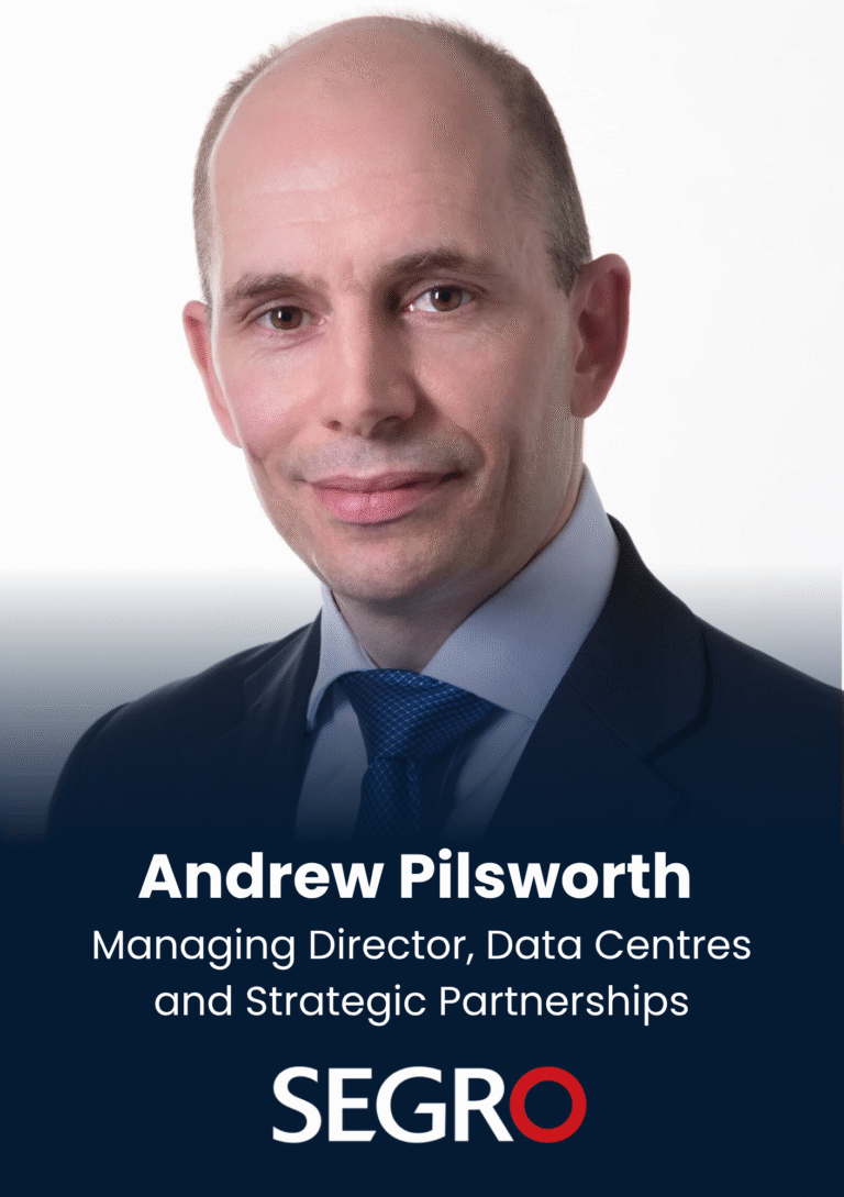 Portrait of Andrew Pilsworth, Managing Director, Data Centres and Strategic Partnerships at SEGRO, in a dark suit and blue tie.