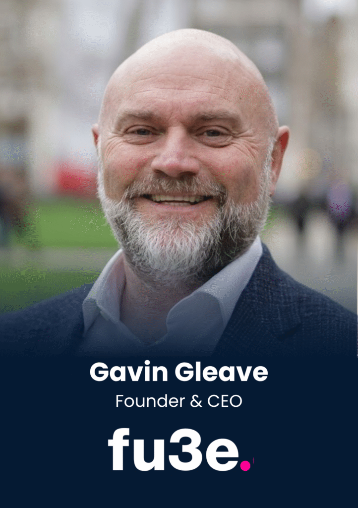 Portrait of Gavin Gleave, Founder & CEO, smiling outdoors in natural light with a blue banner at the bottom of the image.