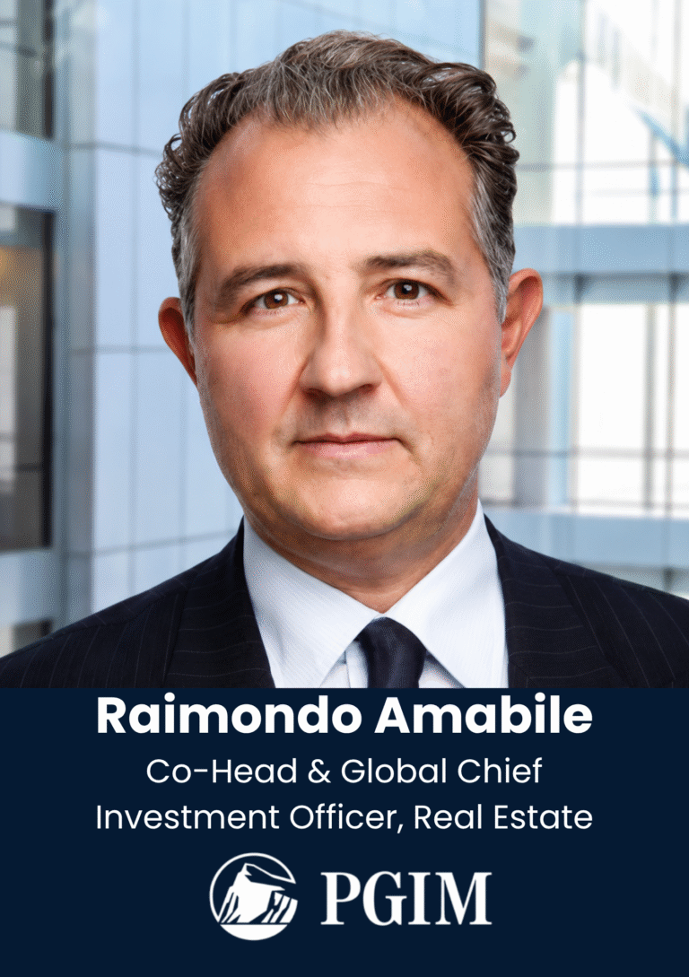 Head-and-shoulders corporate portrait of Raimondo Amabile in a dark suit against a glass-building background.