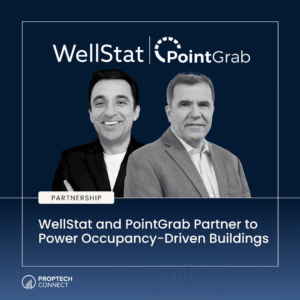 WellStat and PointGrab partnership banner with two businesspeople in suits against a dark blue background.