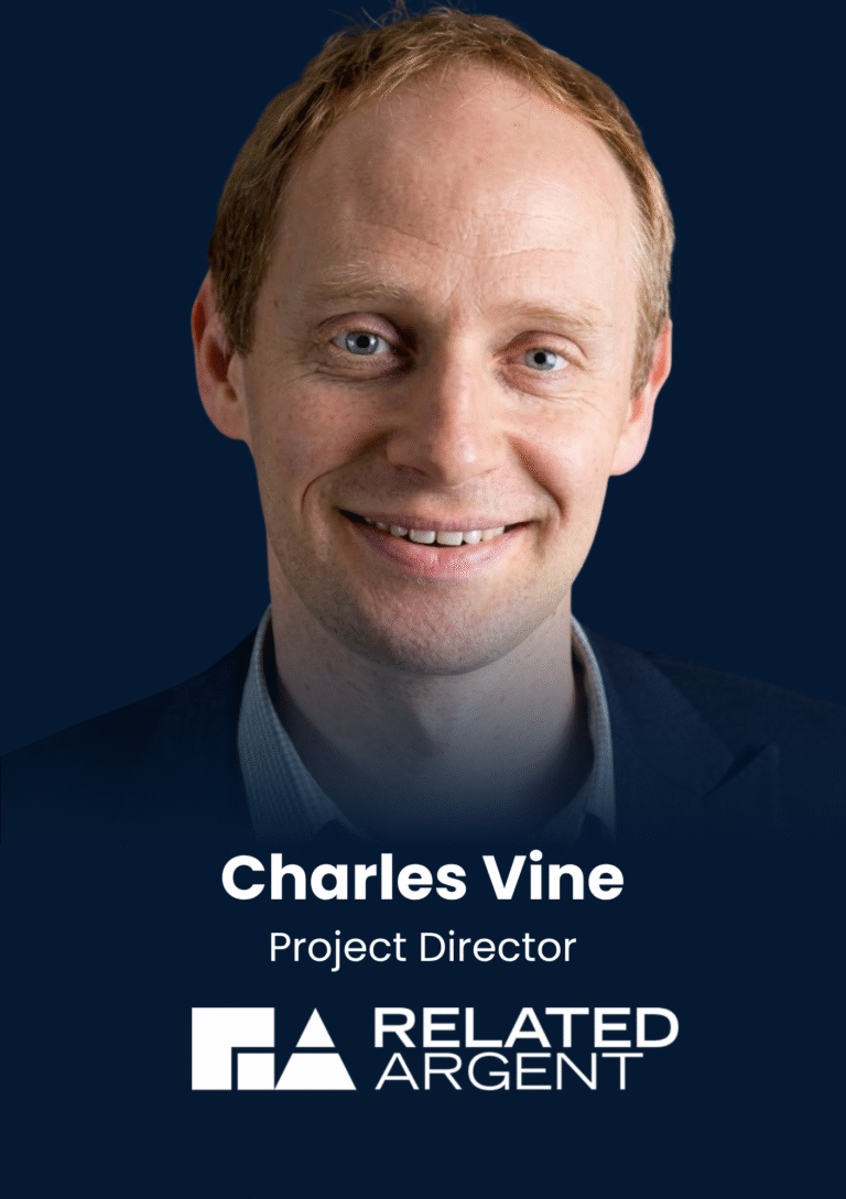 Head-and-shoulders portrait of Charles Vine, Project Director, against a dark blue background with a company logo below.