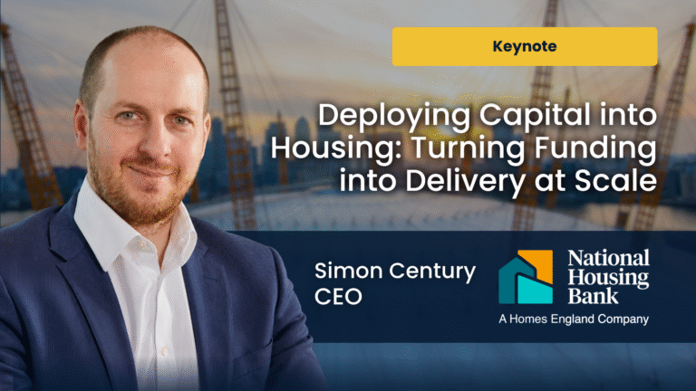 Head-and-shoulders portrait of a man in a blue blazer on the left, with a city skyline background and large white title text, plus a yellow 'Keynote' button and National Housing Bank logo on the right.