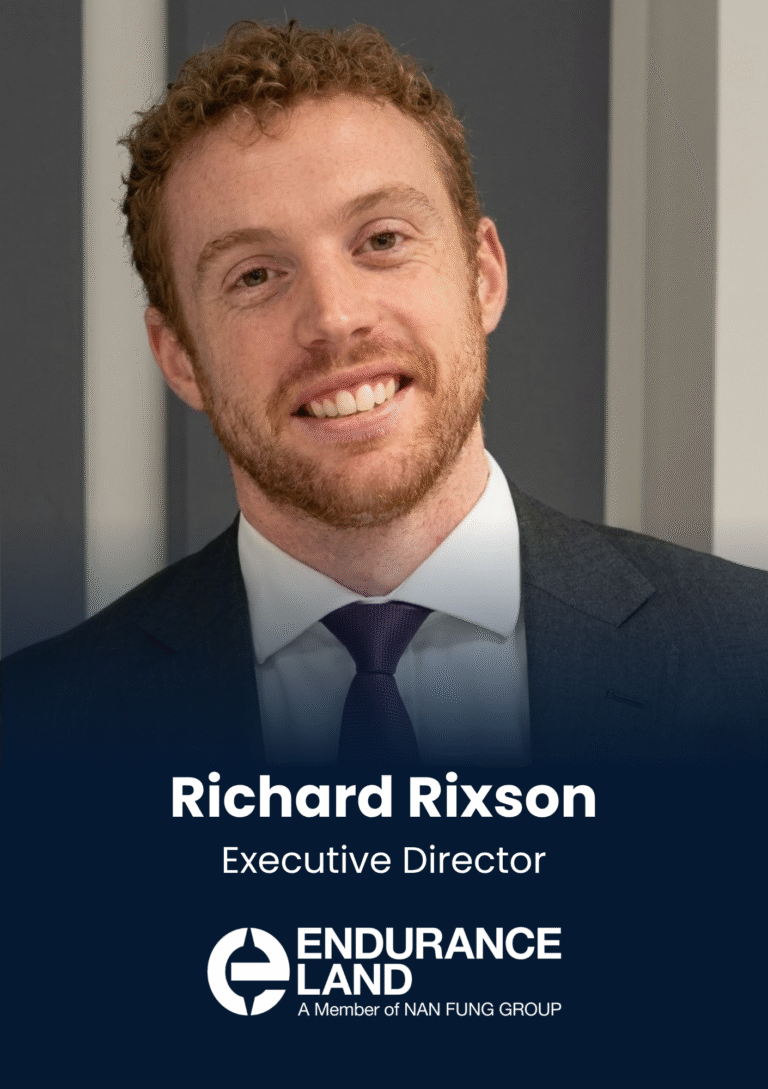 Portrait of Richard Rixson, Executive Director, smiling in a dark suit with a purple tie; Endurance Land branding visible below.