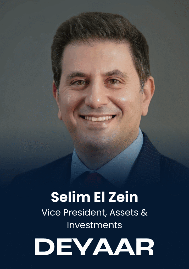 Portrait of Selim El Zein, smiling, in a navy suit against a dark blue gradient background for a professional profile (name and title shown).