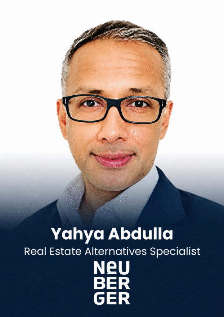 Professional portrait of a smiling man wearing glasses and a blue suit; overlaid text shows the name 'Yahya Abdull' and the title 'Real Estate Alternatives Specialist'.